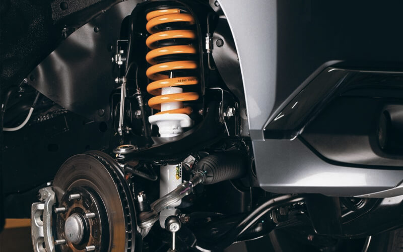 Vehicle on hoist in Triplet Auto Repair workshop